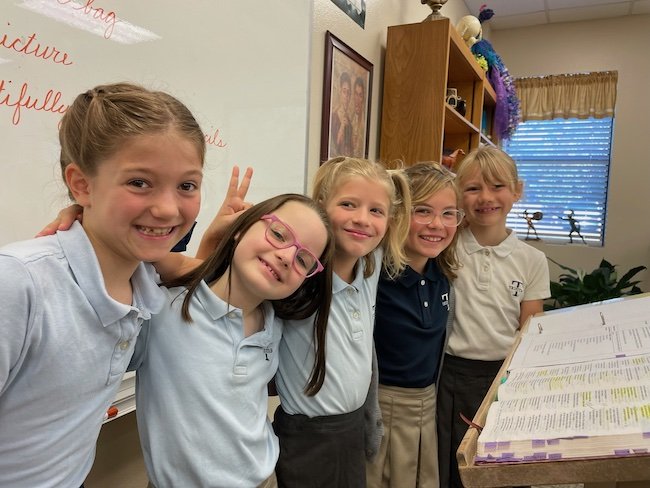 Students learning in a classroom at Trinitas Christian School