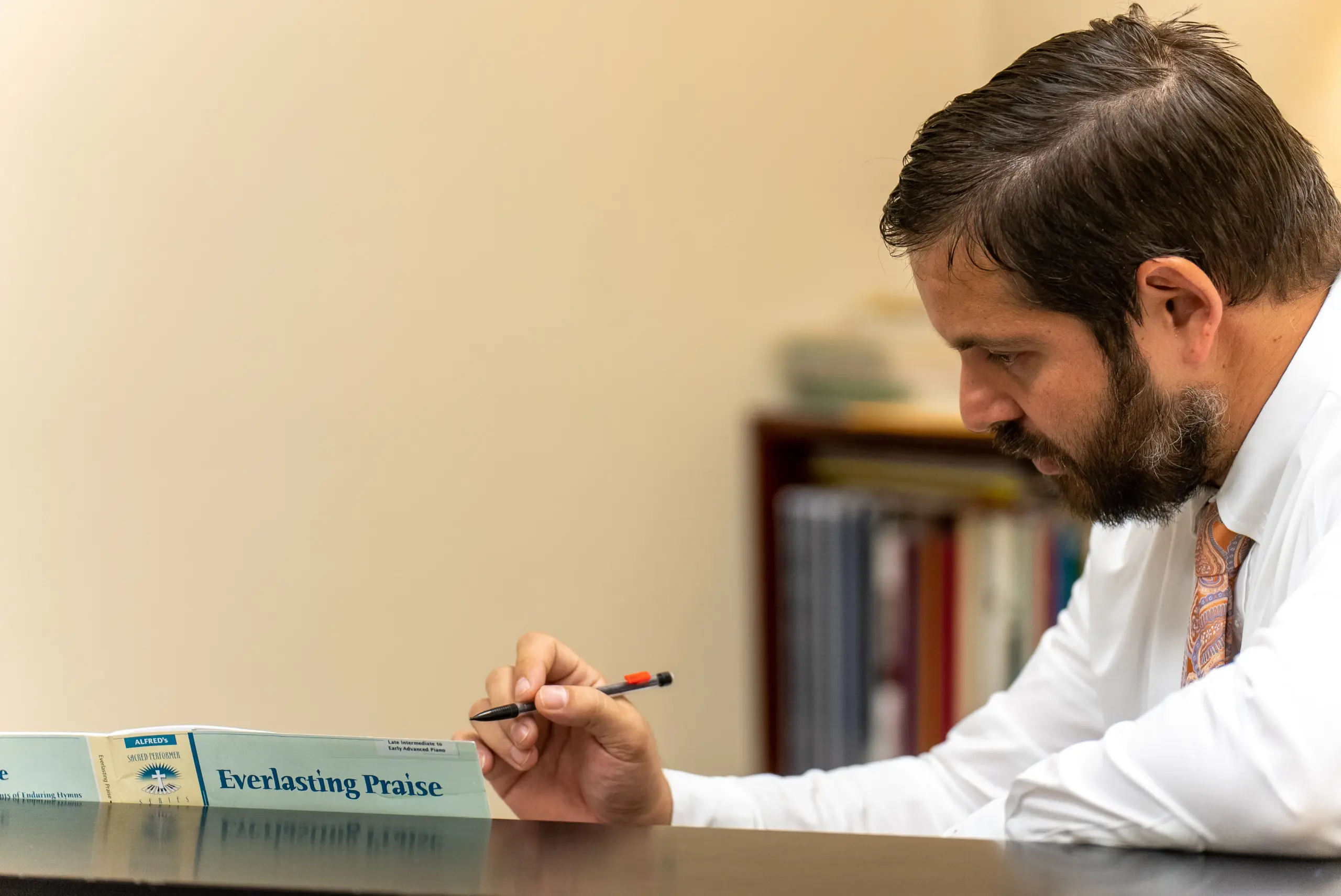 Trinitas faculty collaborating and serving students