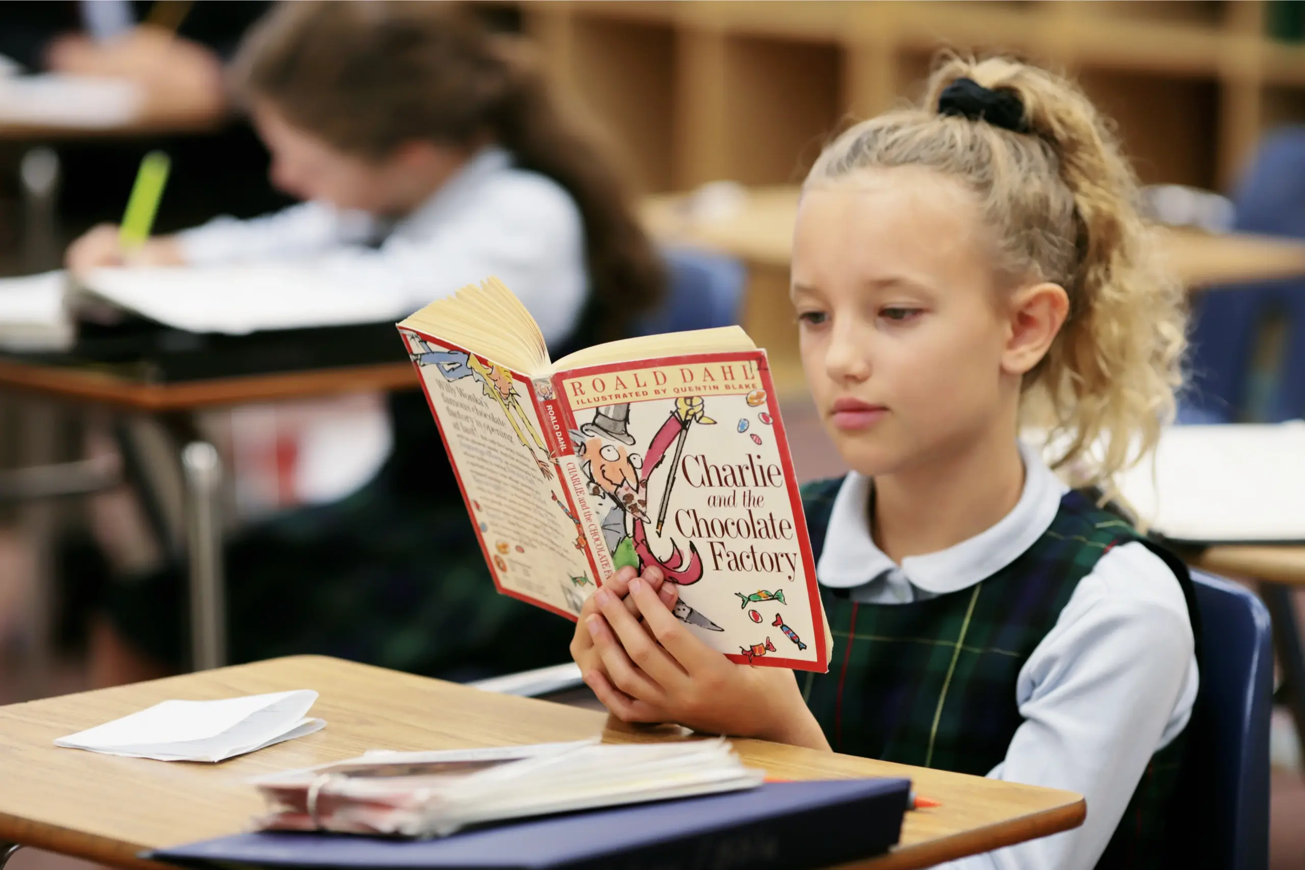 Students and teachers in discussion during classical instruction at Trinitas